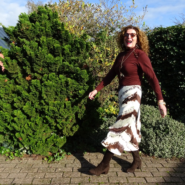 brown outfit with a satin skirt