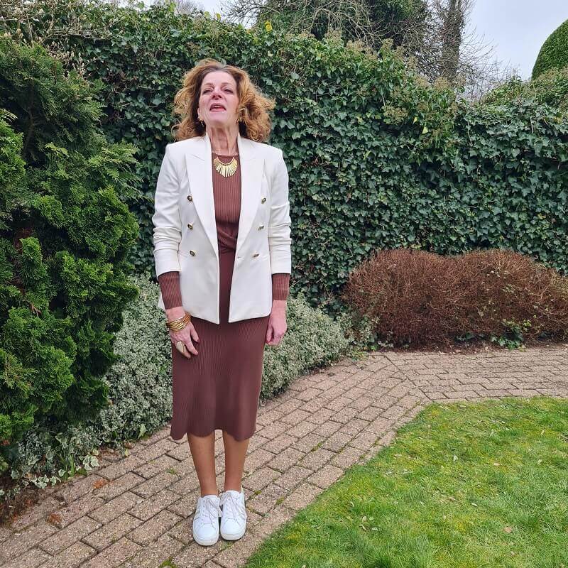 white blazer on brown knit dress