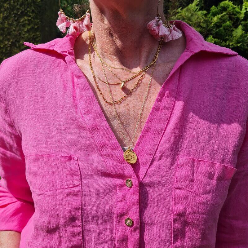multiple golden necklaces