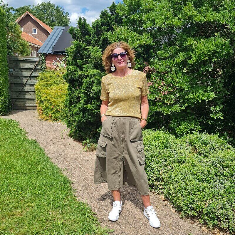 gold top with olive skirt