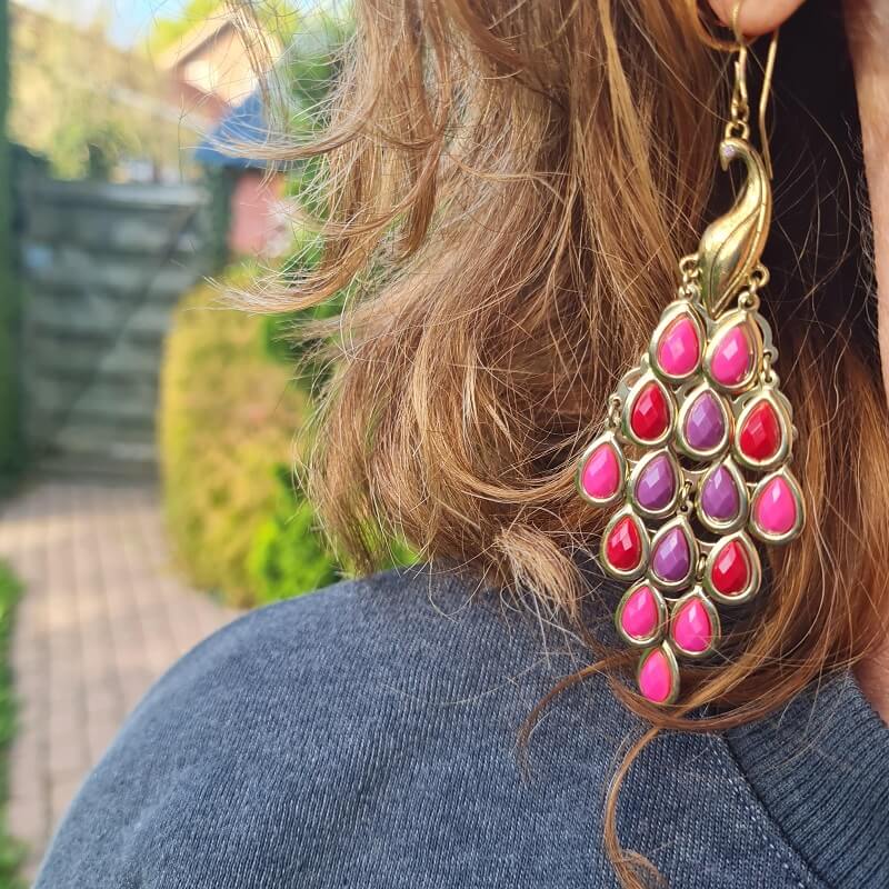 pink statement earrings