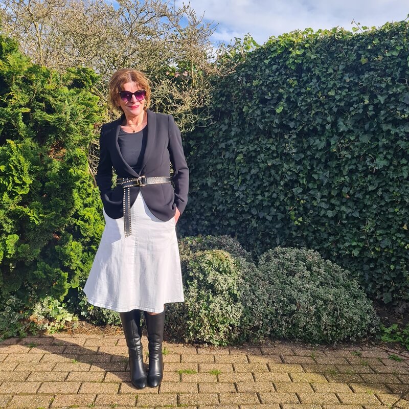 winter white skirt with black boots and blazer