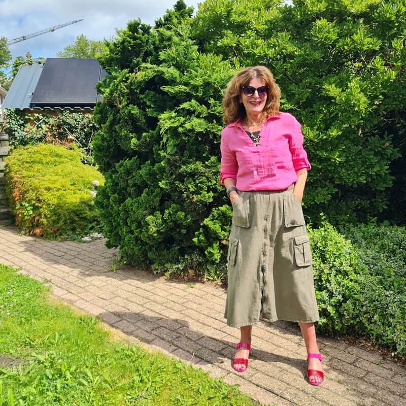 cargo skirt in green with pink blouse