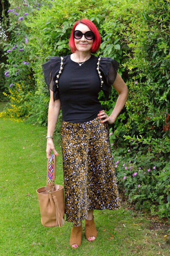 black tee and printed skirt in summer