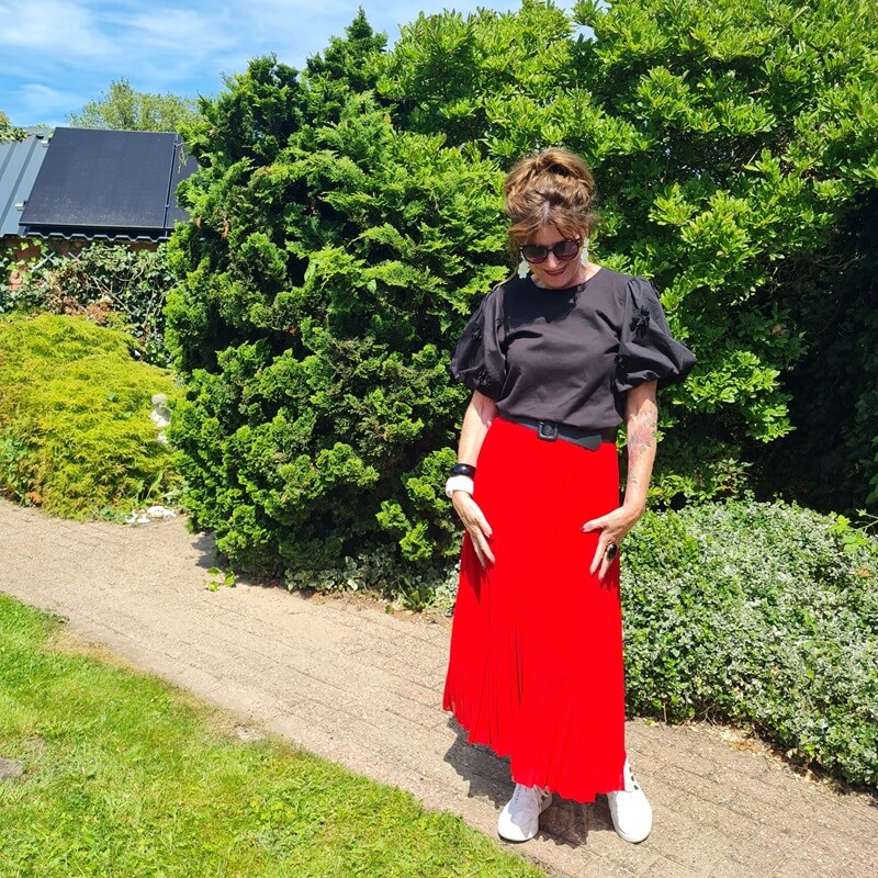 red pleated skirt