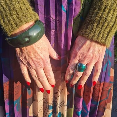 green plastic ring and bracelet
