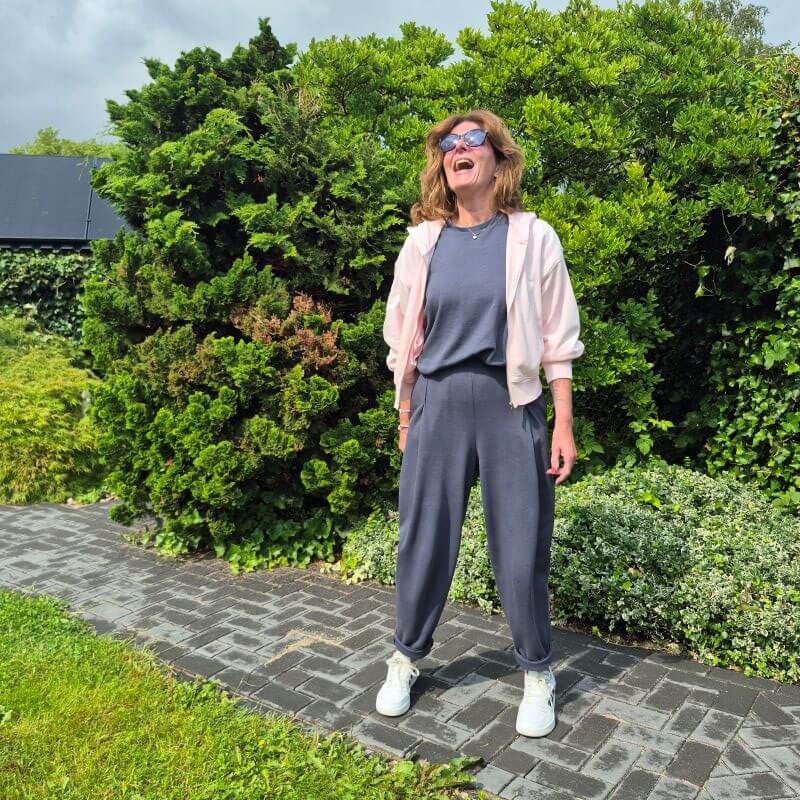 grey joggers and a pink hoody