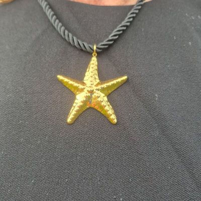gold and black necklace