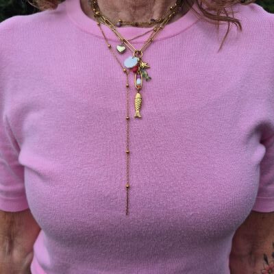layered golden necklaces
