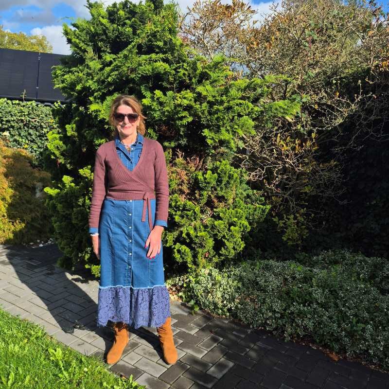 suede boots under a denim dress