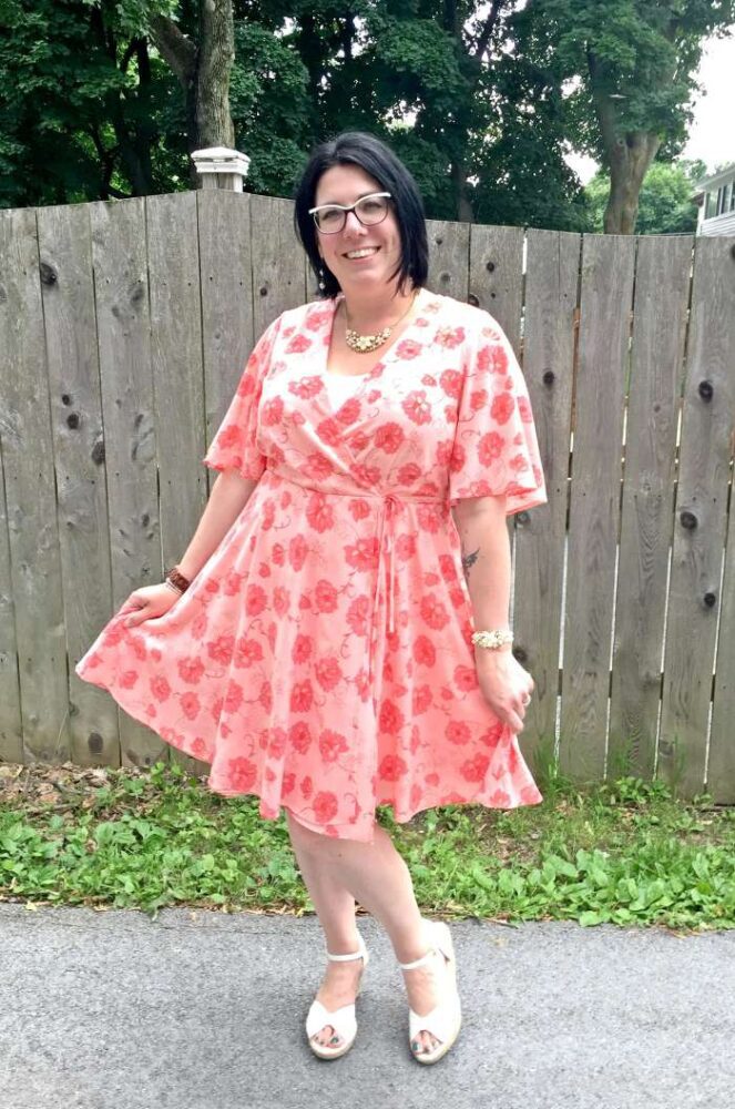 wrap dress in peachy pink