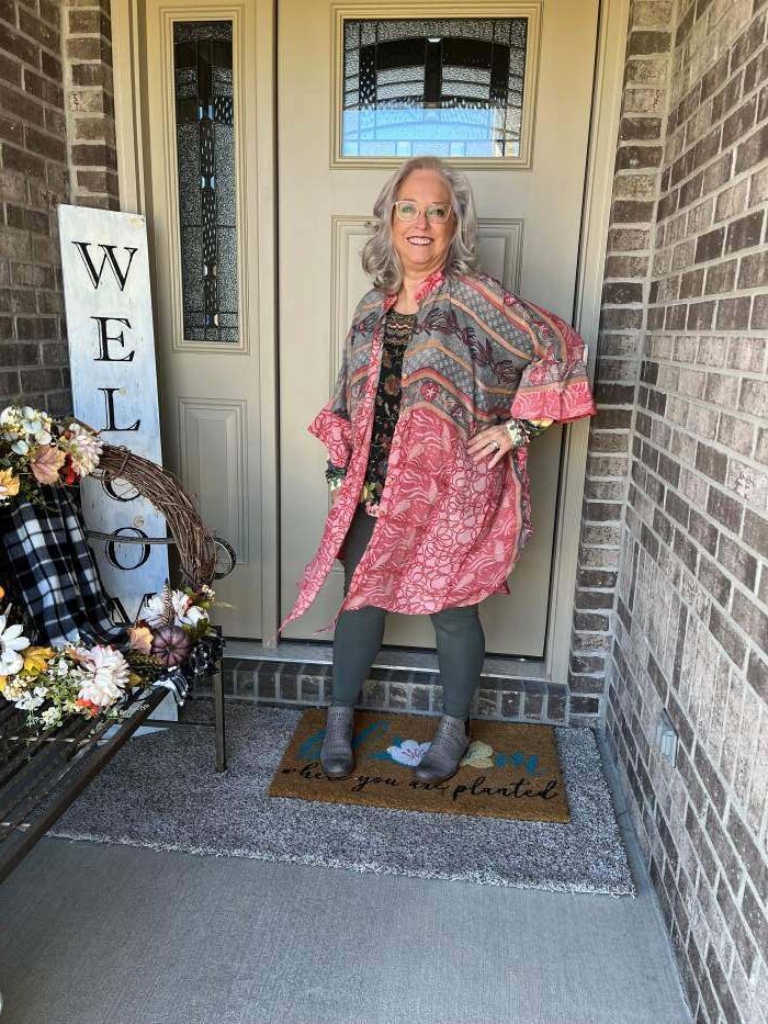 grey leggings under a pink dress