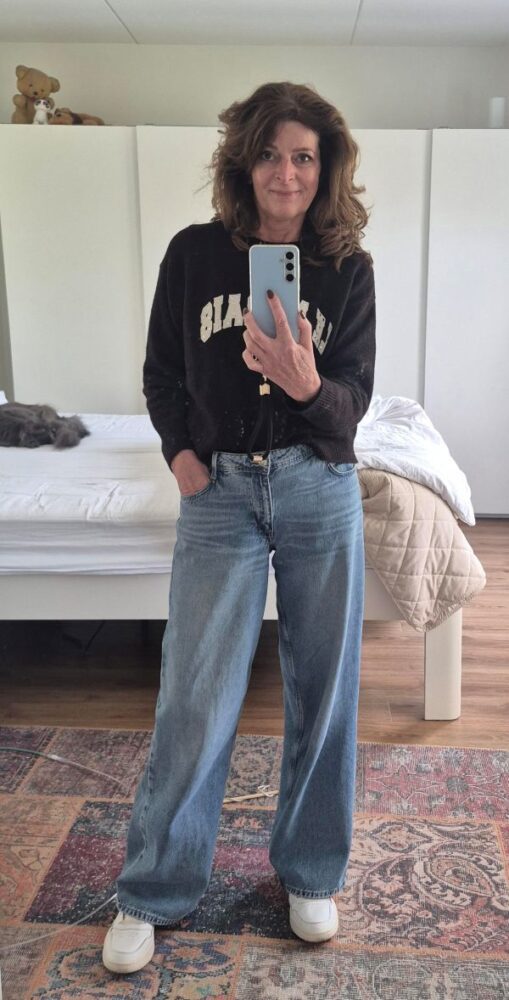 wide leg trousers and a jumper