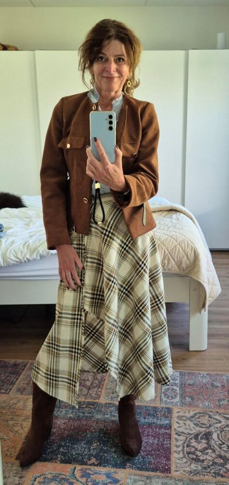 checked skirt and light blue blouse